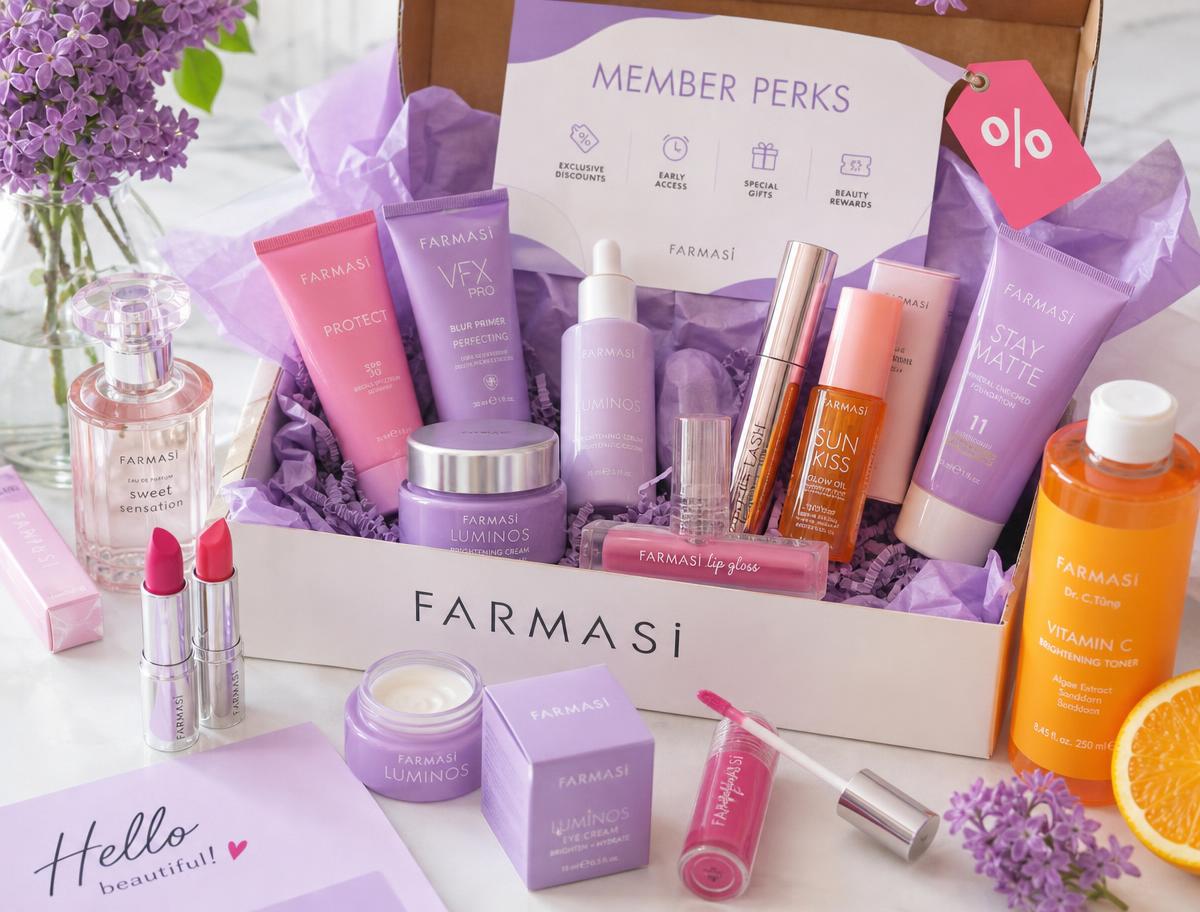 Open FARMASI delivery box in lavender tissue paper with a Member Perks insert card, discount tag and colorful beauty products